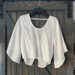 White open-back crop top